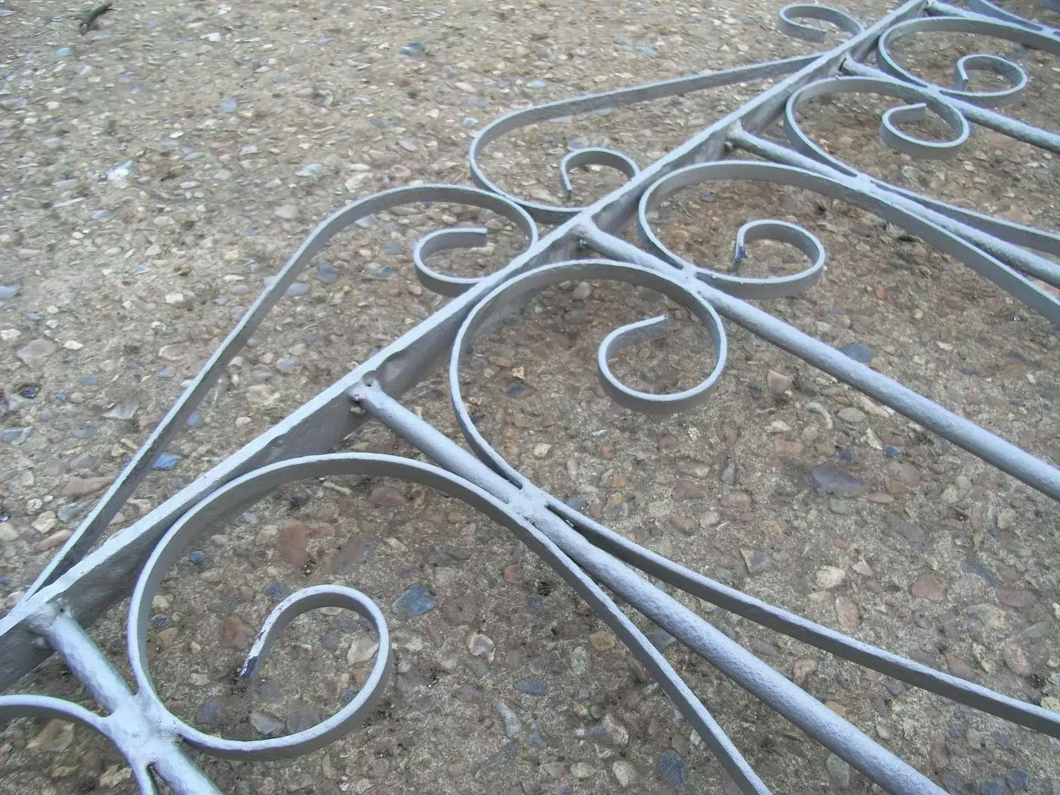 A sandblasted and powder-coated iron railing